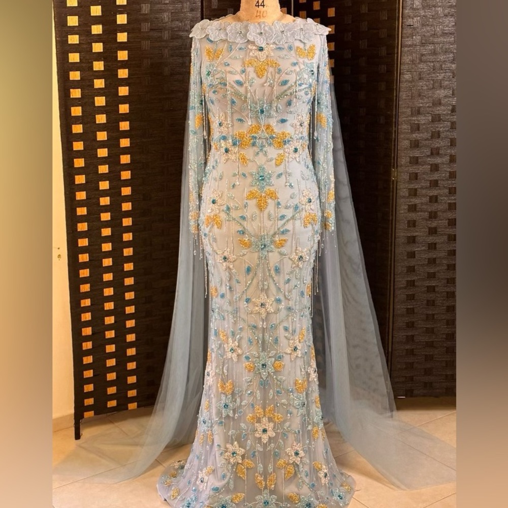 Only worn once custom Ahmad Essa Couture dress. It’s a size 4/6. Handmade